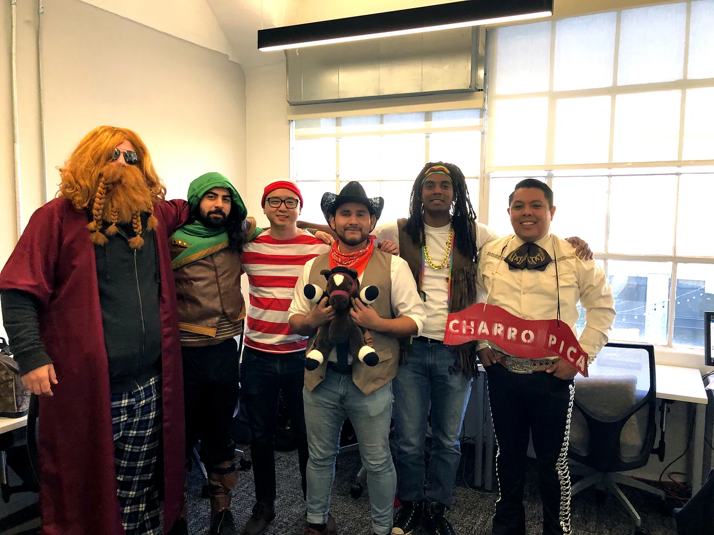 Image of Pierre and his cohort dressed up for Halloween